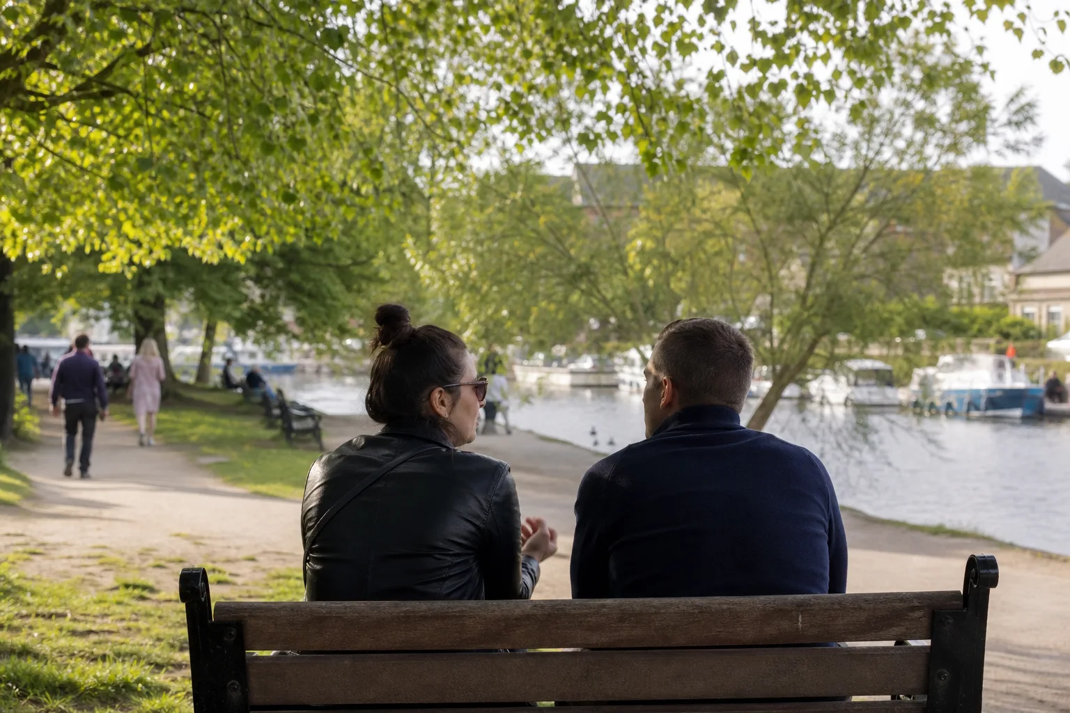 People walking beside the water at Rickmansworth Aquadrome